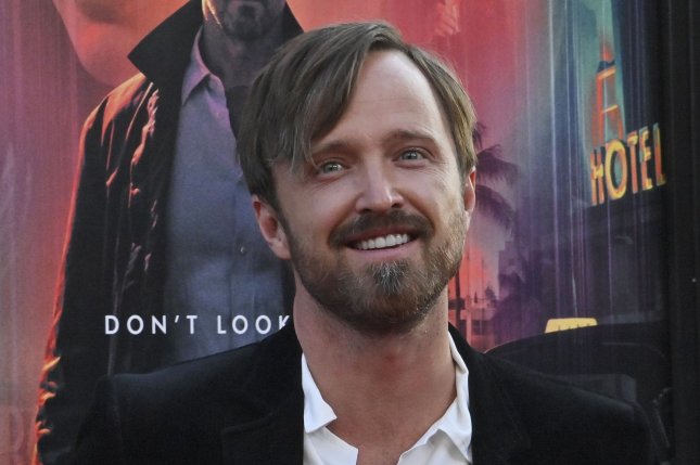 Aaron Paul announces son's birth, says Bryan Cranston will be godfather