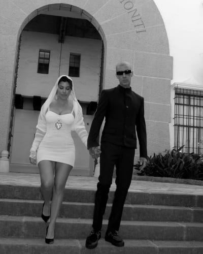 Kourtney Kardashian and Travis Barker Walk Down the Steps