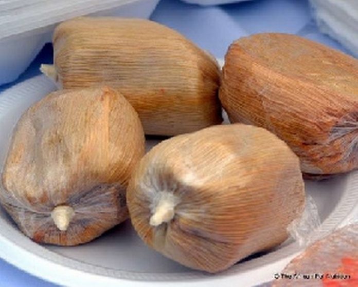 Kenkey is a local Ghanaian food Kenkey is a local Ghanaian food