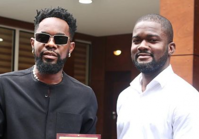 Patoranking and Anthony Dzamefe, CEO of Caveman watches Patoranking and Anthony Dzamefe, CEO of Caveman watches