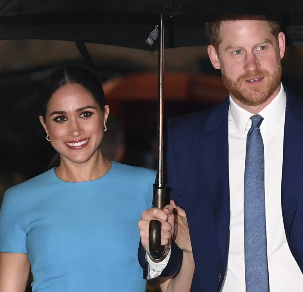 Meghan Markle and Prince Harry Under an Umbrella