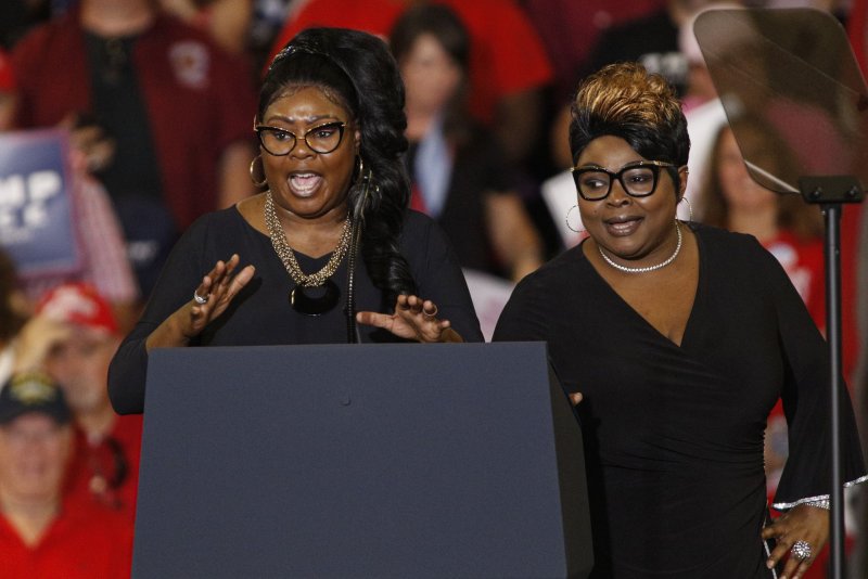 Diamond (L) and Silk speak at a Keep America Great rally in support of Republican congressional candidate Dan Bishop in Fayetteville, North Carolina in 2019. Diamond died Monday at the age of 51. File Photo by Nell Redmond/UPI