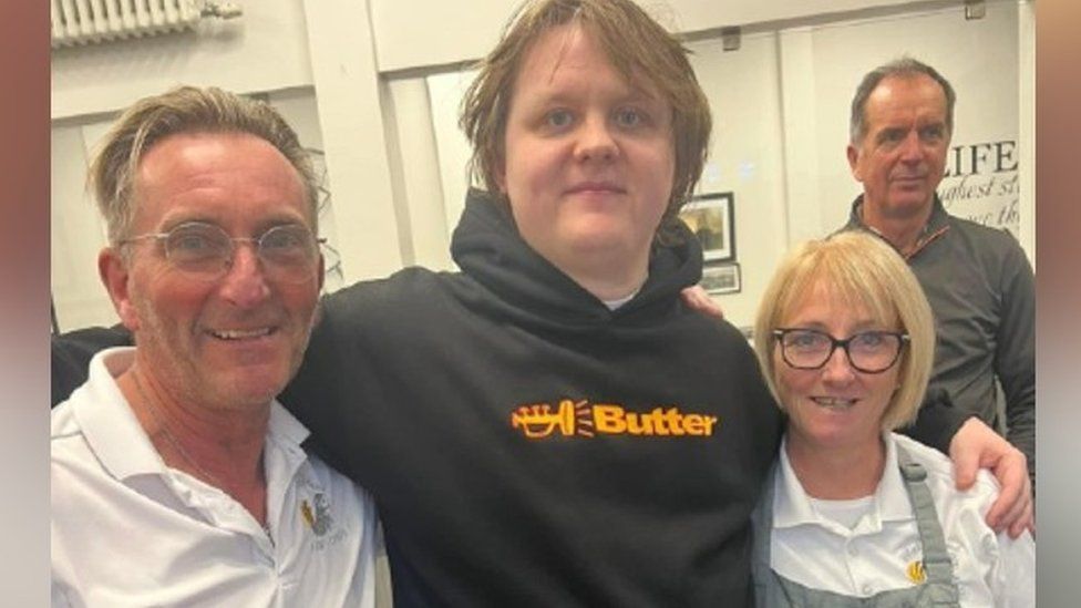 Lewis Capaldi with staff