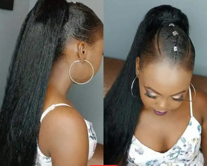 Kinky straight hairstyle with ponytail.