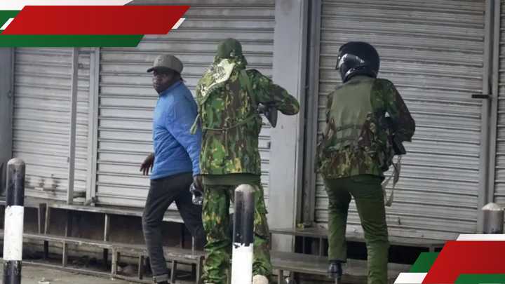 Boniface Kariuki walking away from police Boniface Kariuki walking away from police