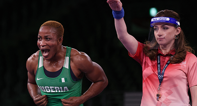 Nigeria's Blessing Oborududu reacts after winning against Mongolia's Battsetseg Soronzonbold in their women's freestyle 68kg wrestling semi-final match during the Tokyo 2020 Olympic Games at the Makuhari Messe in Tokyo on August 2, 2021. Jack GUEZ / AFP