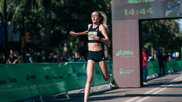 Eilish McColgan crosses the line at the Asics META: Time: Trials