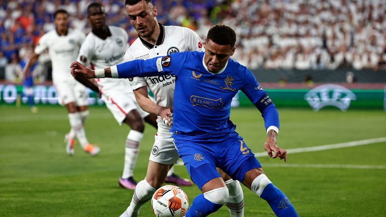 Frankfurt&#39;s Filip Kostic, left, challenges Rangers&#39; James Tavernier
