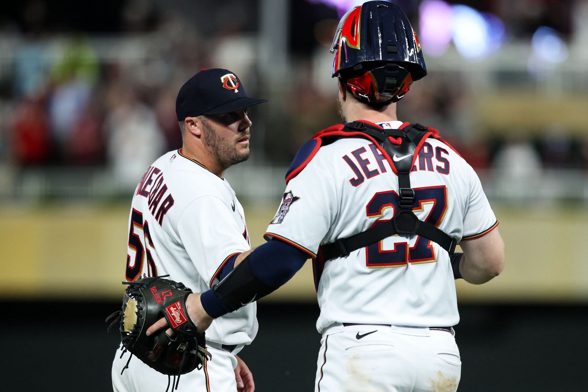 Caleb Thielbar and Ryan Jeffers celebrate a Minnesota Twins victory over the New York Yankees.