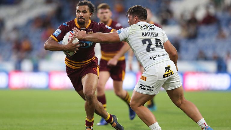 Jermaine McGillvary is tackled by Benjamin Jullien in Perpignan