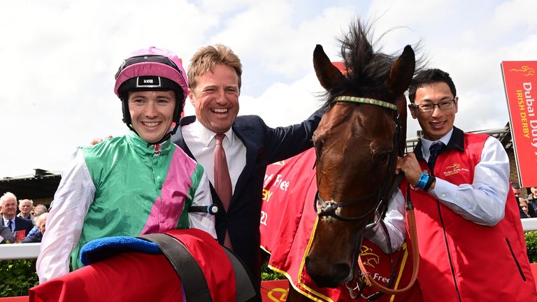 Colin Keane and Ralph Beckett pose with Westover after winning the Irish Derby