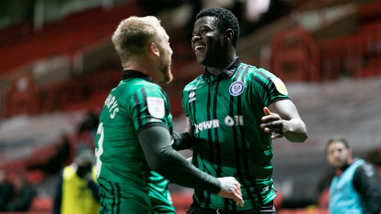 Kwadwo Baah (right) made his Football League debut for Rochdale aged 16 having spent time with Kinetic Academy following his release by Crystal Palace