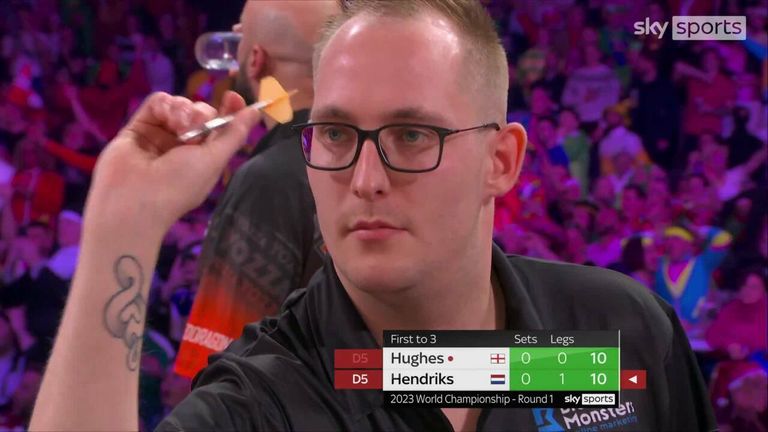 Jimmy Hendriks takes the second leg of the first set against Jamie Hughes after thirteen darts were missed between the pair!