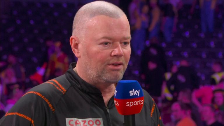 Raymond van Barneveld reacts to his round two win against Ryan Meikle in 2023 World Darts Championship.