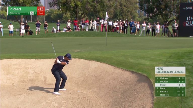 Patrick Reed moved within a shot of leader Rory McIlroy after a brilliant bunker hole-out on the sixth hole