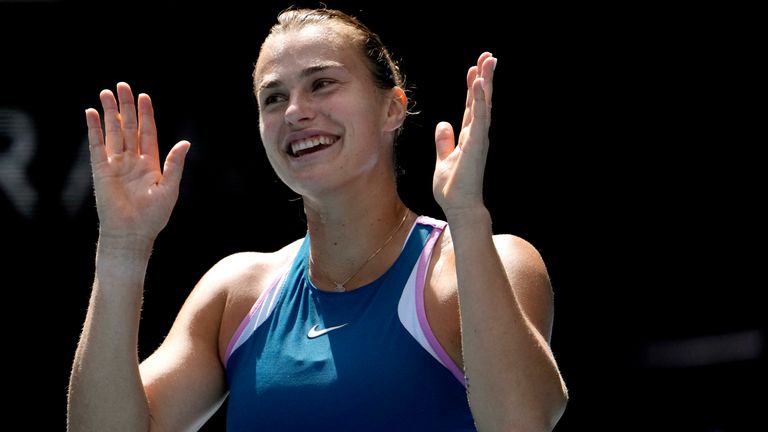 Aryna Sabalenka of Belarus reacts after defeating Elise Mertens of Belgium in their third round match at the Australian Open tennis championship in Melbourne, Australia, Saturday, Jan. 21, 2023. (AP Photo/Ng Han Guan)