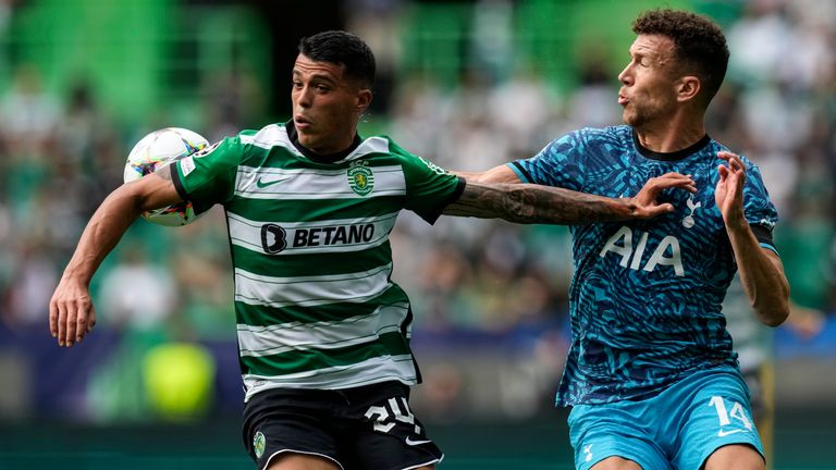 Sporting&#39;s Pedro Porro, left, and Tottenham&#39;s Ivan Perisic challenge for the ball during a Champions League group D soccer match between Sporting CP and Tottenham Hotspur at the Alvalade stadium in Lisbon, Tuesday, Sept. 13, 2022. (AP Photo/Armando Franca)