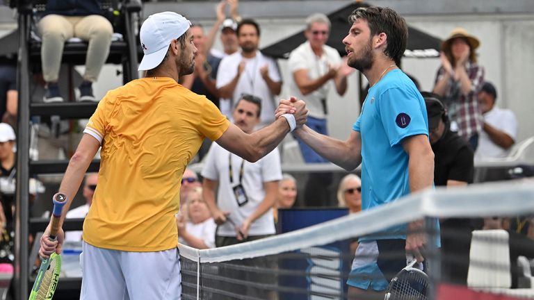 Richard Gasquet of France shakes hands with Cameron Norrie of Great Britain after winning the Mens singles final of the ASB Classic in Auckland, New Zealand, Saturday Jan 14, 2023. (Andrew Cornaga/Photosport via AP)
