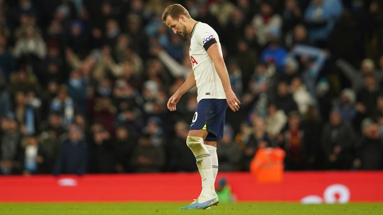 Tottenham&#39;s Harry Kane walks in dejection after Manchester City&#39;s Riyad Mahrez scores his side&#39;s fourth goal during the English Premier League soccer match between Manchester City and Tottenham Hotspur at the Etihad Stadium in Manchester, England, Thursday, Jan. 19, 2023. (AP Photo/Dave Thompson)