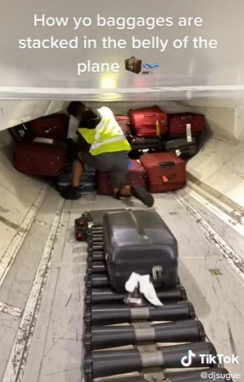 He starts off by unfurling a roller that helps to move the bags across the floor, then he stacks them in layers of three from the back