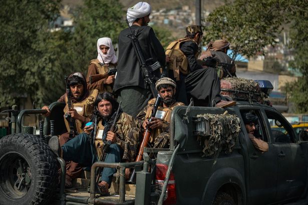 Taliban fighters on patrol