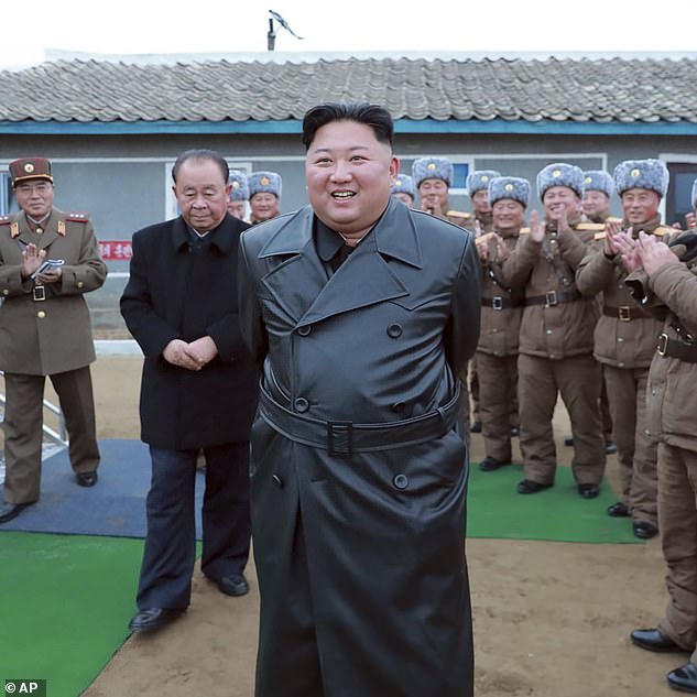 Initially the preserve of the wealthy elite, cheap knock-offs of Kim's coat have been appearing in markets in recent months, sources claimed (pictured in the coat for the first time in 2019)