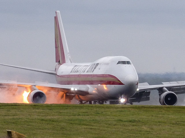 The right hand side of the plane could be seen in orange flames as the aircraft touched down on the tarmac