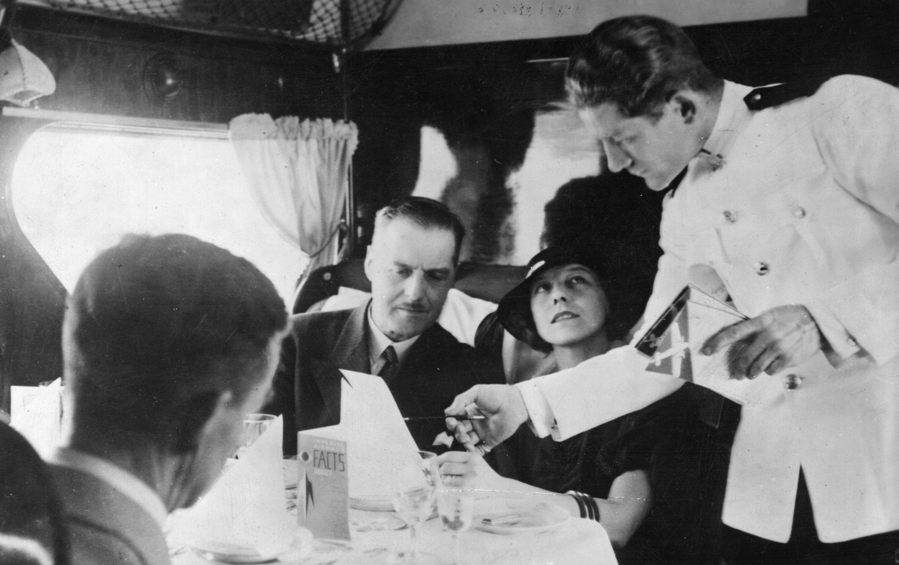 Waiter service aboard Imperial Airways 'Scylla' during its flight from London to Paris in 1935