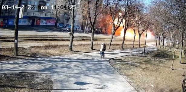 This is the moment a Russian missile explodes on a street in Kyiv