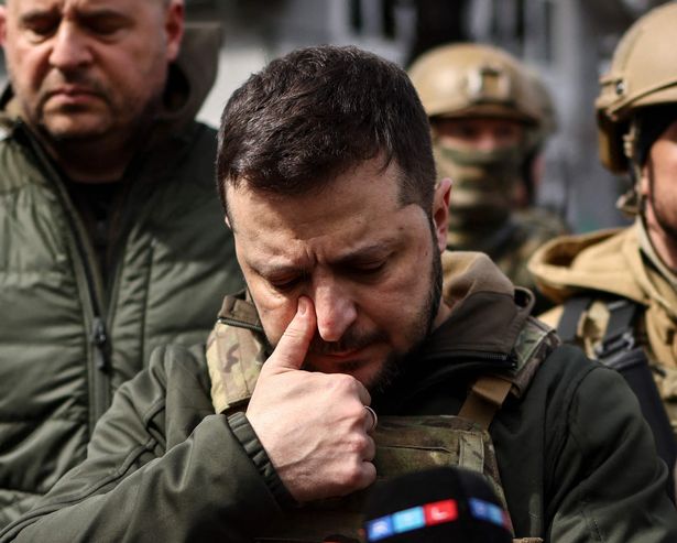 0_UKRAINE-RUSSIA-CONFLICT President Volodymyr Zelensky broke down in tears as he visited Bucha today ( Image: AFP via Getty Images)