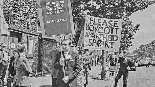 A demonstration outside Lord's Cricket Ground in London during the First Test between England and South Africa, UK, 24th July 1965. They are asking others to boycott the match in protest against South Africa's apartheid policies. (Photo by Evening Standard/Hulton Archive/Getty Images).