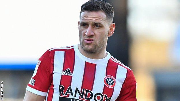 Sheffield United's Billy Sharp was assaulted by a fan during a pitch invasion
