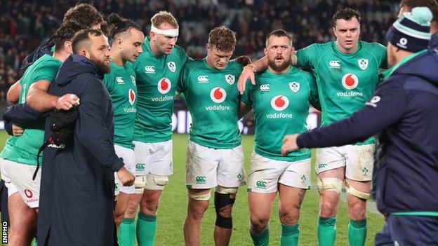 The Ireland players show their dejection after Saturday's defeat at Eden Park
