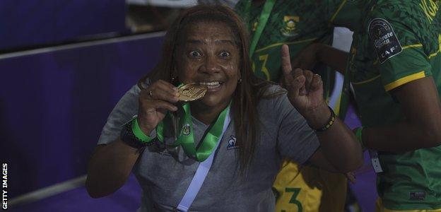 South Africa coach Desiree Ellis celebrates after winning the Women's Africa Cup of Nations