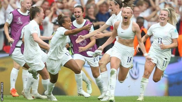 Chloe Kelly celebrates scoring England's winner against Germany in the Euro 2022 final at Wembley