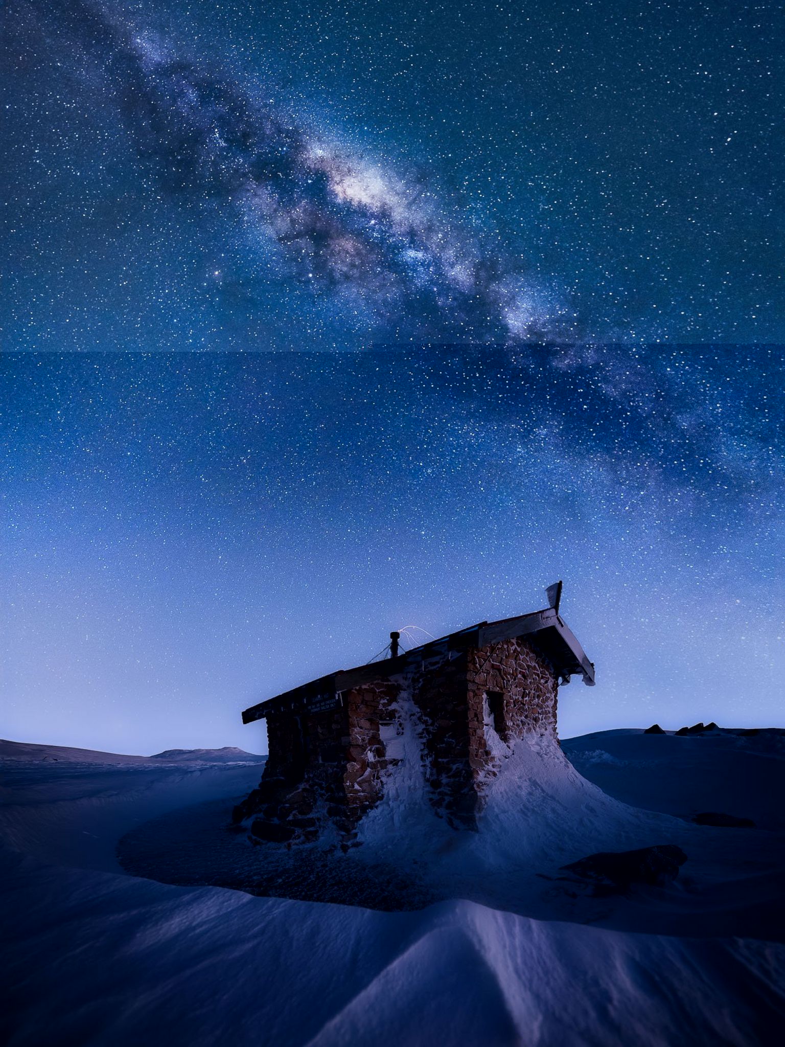 The Milky Way over and observation hut on Mount Kosciuszko in Australia.