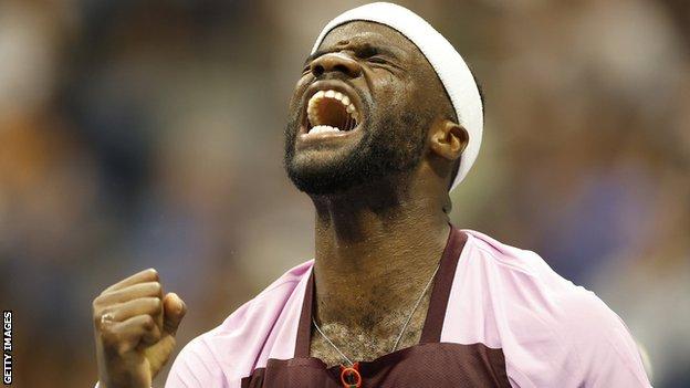 Frances Tiafoe celebrates