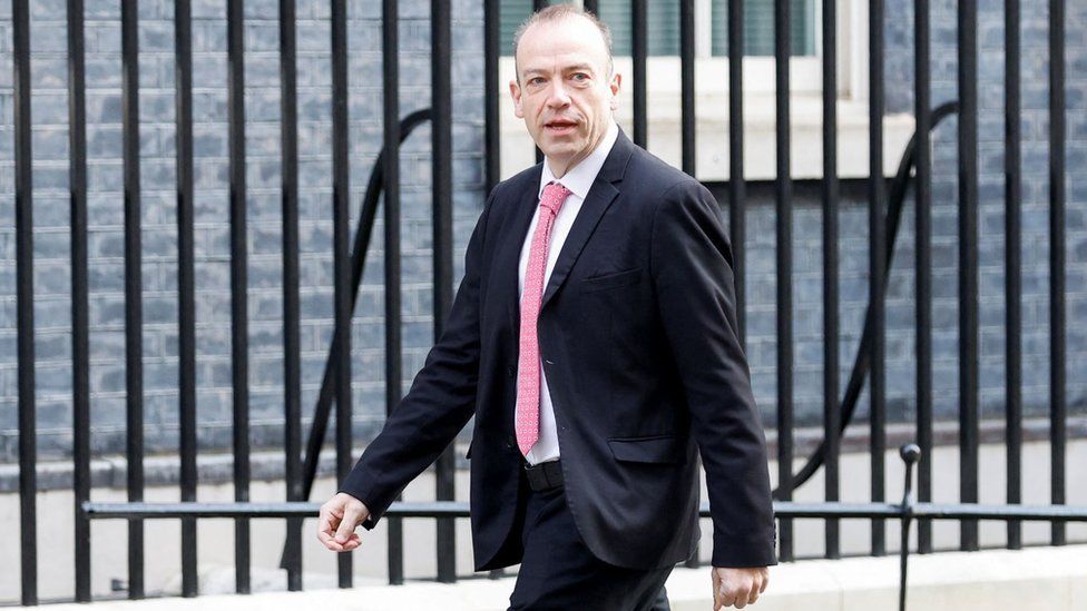 Chris Heaton-Harris walking outside Downing Street in Mar 2022