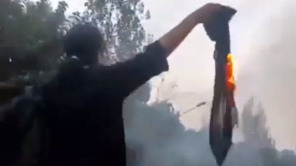 A video posted on social media shows Nika Shakarami burning a headscarf at a protest in Tehran, Iran, on 20 September 2022