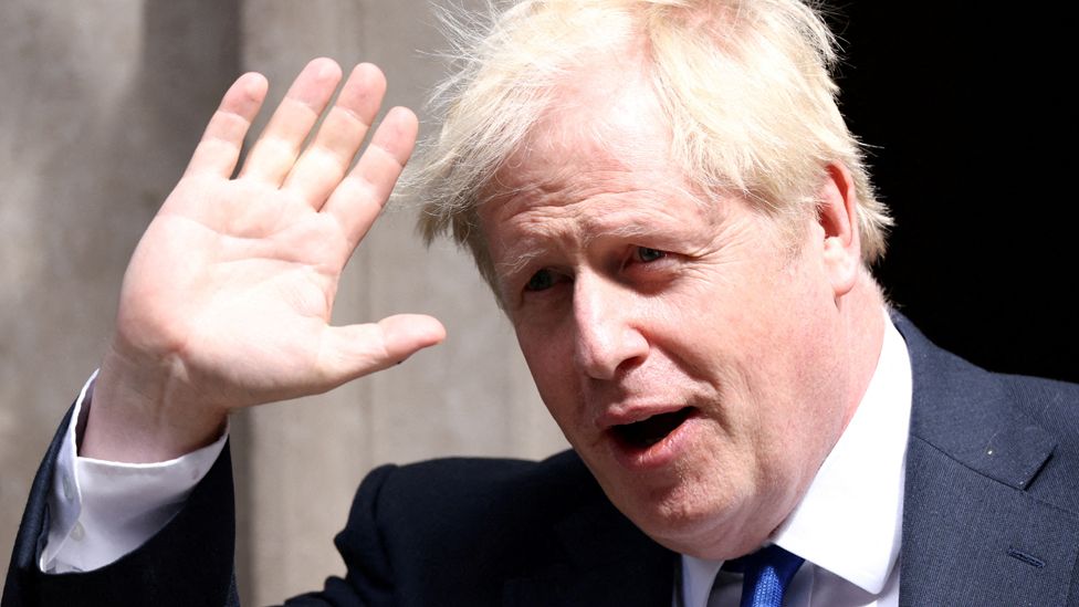 Boris Johnson waving