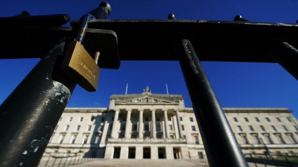 A lock on a gate outside Parliament Buildings at Stormont