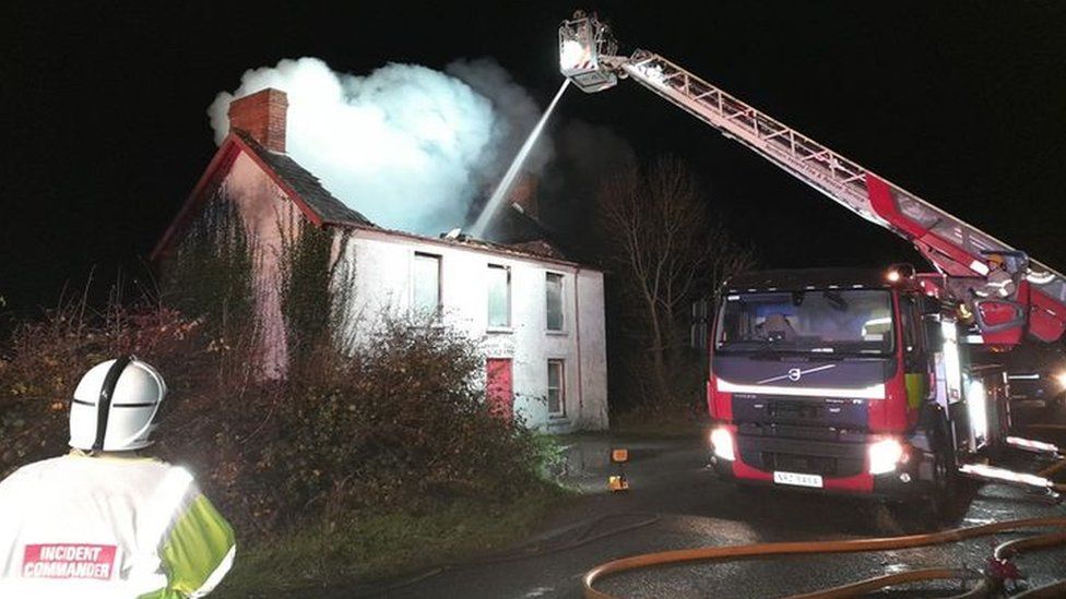 Firefighters tackling the blaze with an aerial appliance