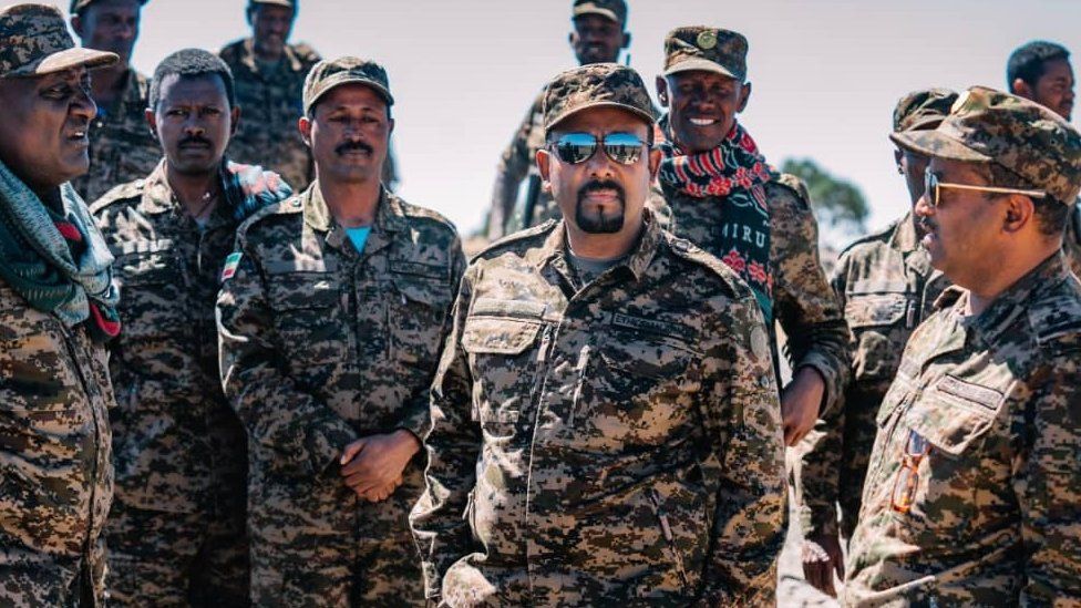 Abiy Ahmed pictured on the front line in sunglasses (archive shot)
