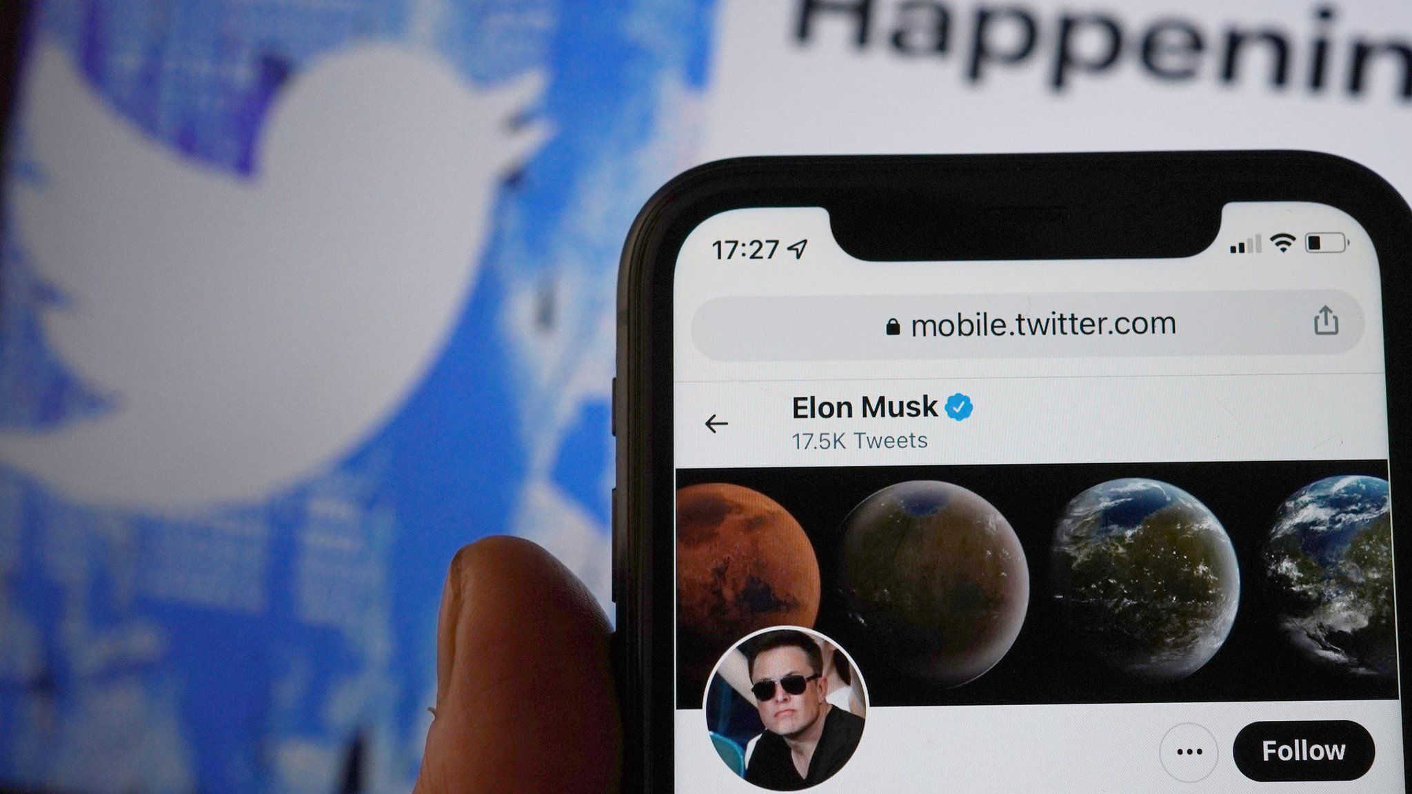 Elon Musk's Twitter profile with Twitter logo