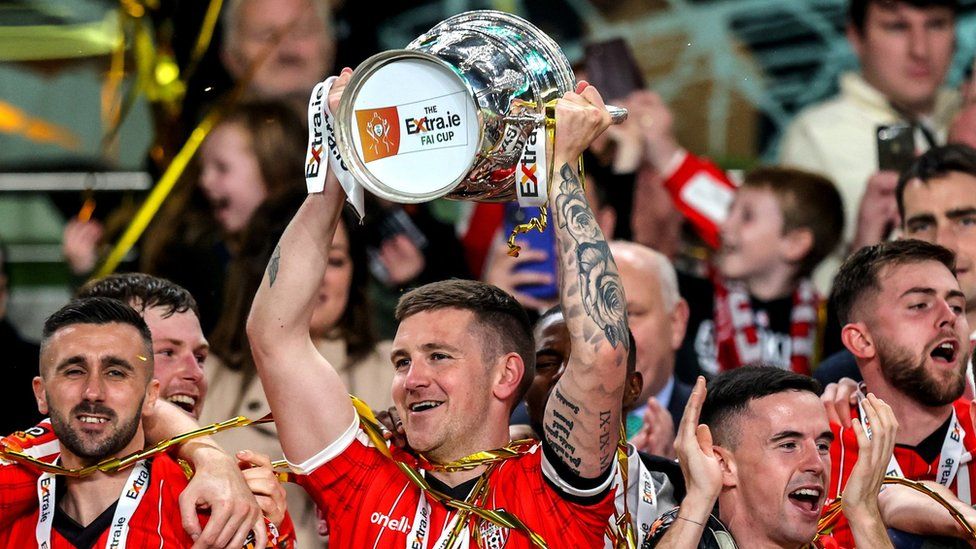 Derry City captain Patrick McEleney lifts the FAI Cup at the Aviva Stadium
