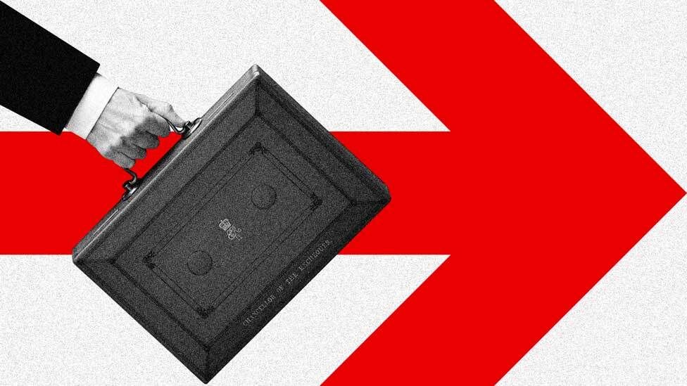The famous red briefcase used on budget day being swung by an out-of-frame person, set against a red forward arrow graphic
