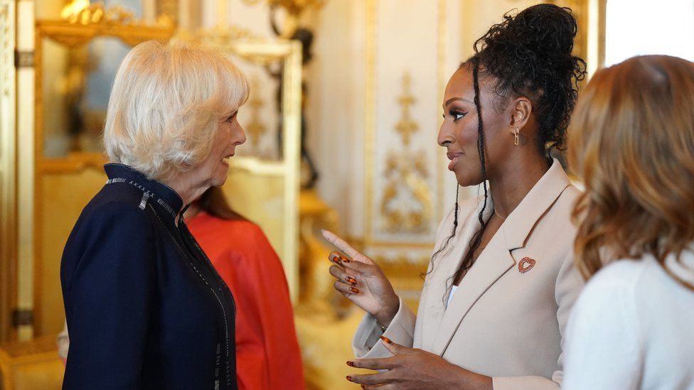 The Queen Consort with Alexandra Burke during a reception for winners of the Queen's Commonwealth Essay Competition, at Buckingham Palace in London. Picture date: Thursday November 17, 2022.
