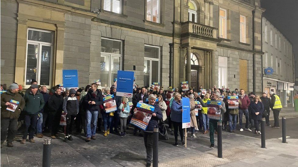 Campaigners gathered outside Enniskillen Town Hall to protest against the trust's decision