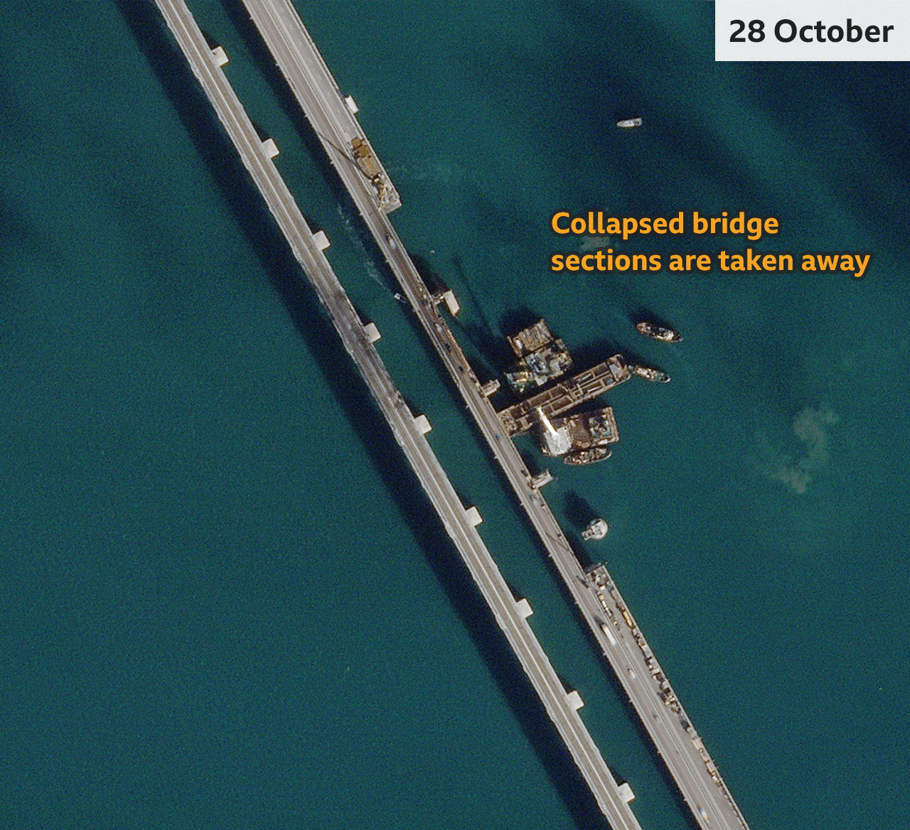 On 19 October, three barges carrying cranes can be seen floating near the damaged bridge sections