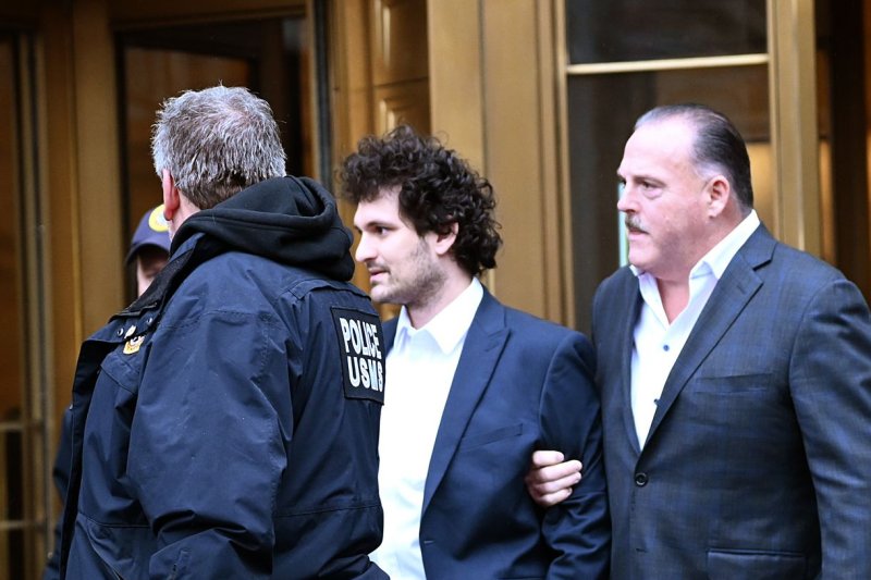 Sam Bankman-Fried founder and chief executive officer of FTX leaves federal court in Manhattan, on December 22 in New York. The Bahamas said it holds $3.5 billion in FTX cryptocurrency. Photo by Louis Lanzano/ UPI | <a href="/News_Photos/lp/0c65024d698a91038d37a94800b6bc77/" target="_blank">License Photo</a>